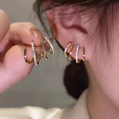 109. Illusion stud earrings