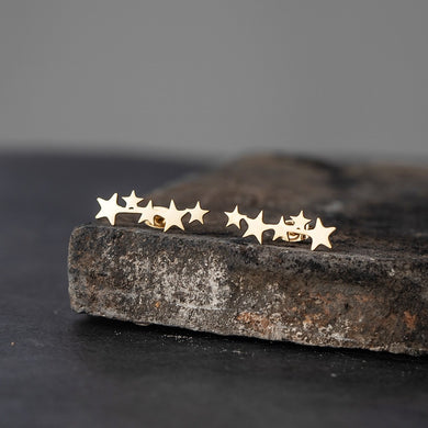 118. Shower of stars stud earrings in gold