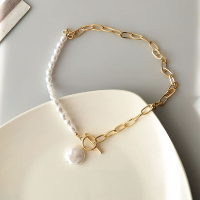 131. Pearl & chain pendant necklace